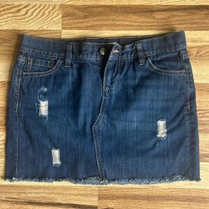 Old Navy slightly distressed denim mini skirt. Size 2